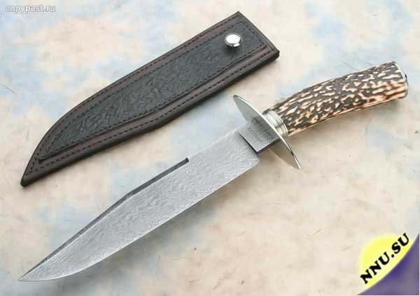 Ножи из дамасской стали ( 15 фото)